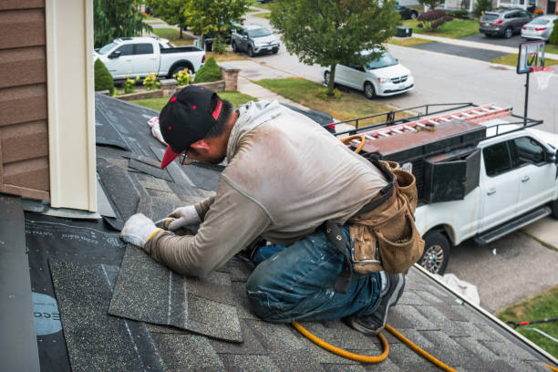 Professional Roofing technician working in Burton, WA